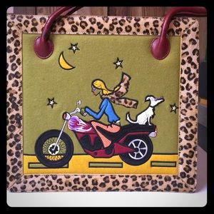 Nicole Miller large hand bag.